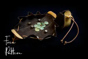 open and close money pouch with coins and playing dice laying on it